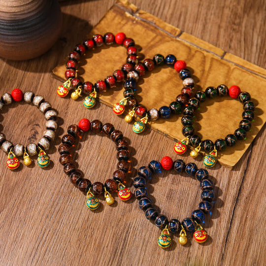Colorful Cinnabar Bead Gold Swallowing Bracelet
