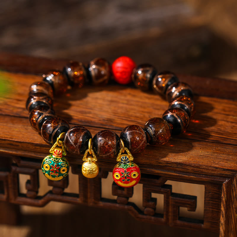Colorful Cinnabar Bead Gold Swallowing Bracelet