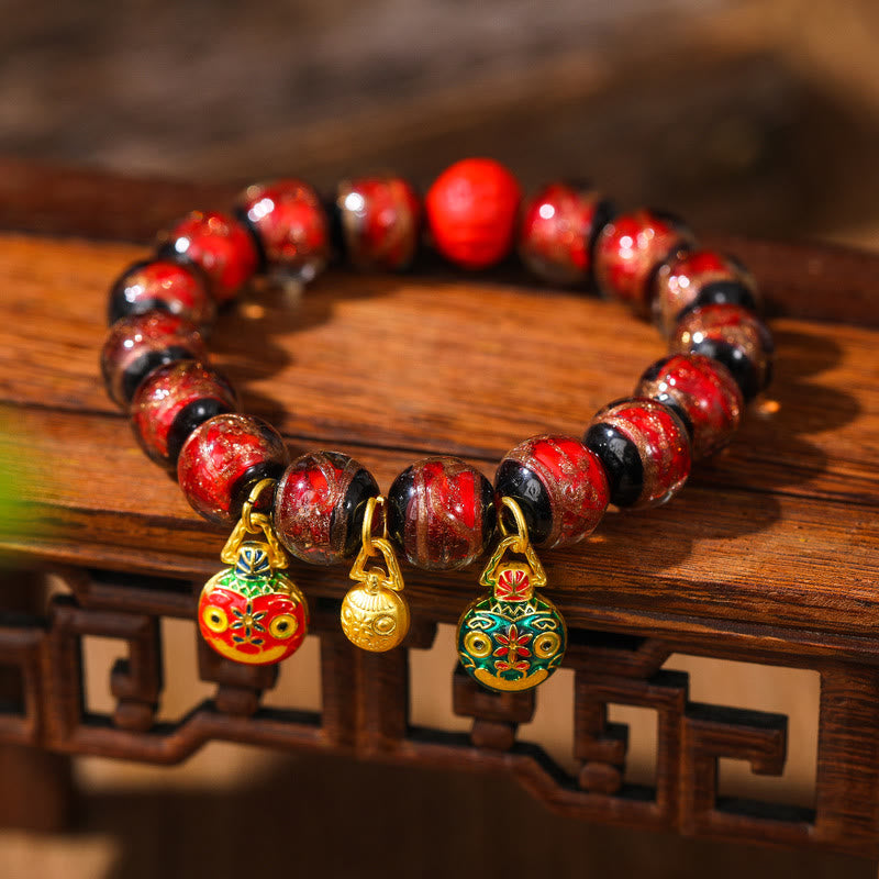 Colorful Cinnabar Bead Gold Swallowing Bracelet