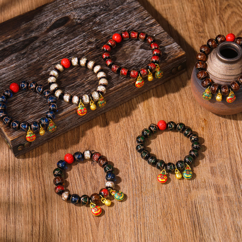 Colorful Cinnabar Bead Gold Swallowing Bracelet